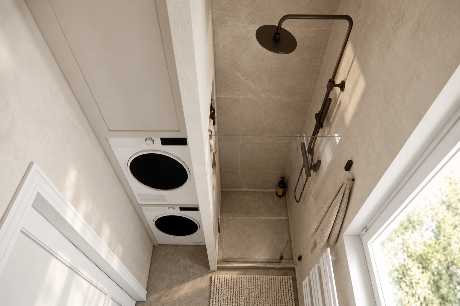 Shower room with a glass shower door and a built-in washing machine and tumble dryer