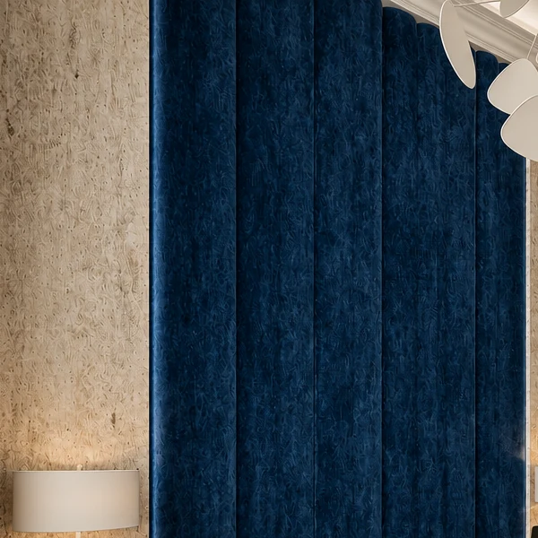 Deep blue velvet wall covering beside a patinated stone-effect wall surface