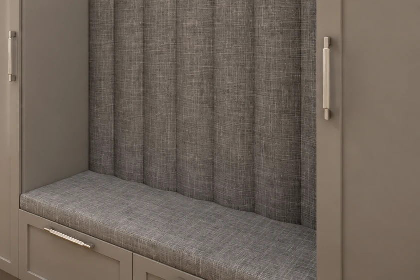 Upholstered bench with a vertically channel-stitched back panel, and a framed drawer front with a metal handle below it
