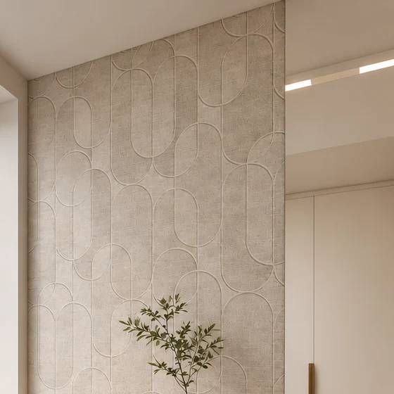 Oval-patterned relief wall cladding lit from the side, with the opening to the walk-in wardrobe and linear lights recessed into the ceiling on the right