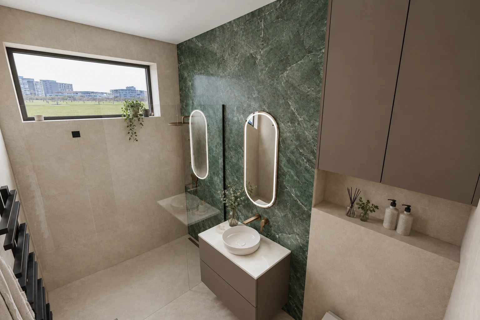 The second bathroom with a green textured wall, two oval backlit mirrors and a horizontal window