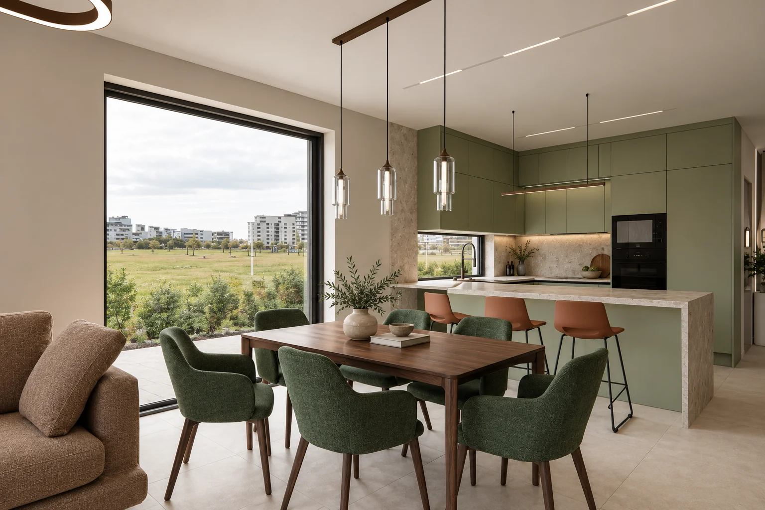 Living room, dining area and kitchen in one space with large glazing, a wooden dining table, green upholstered chairs and a green kitchen